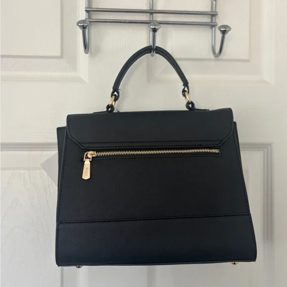 Sleek Sophisticated Trina Turk Black Handbag or Crossbody with Gold Hardware - Picture 3 of 11